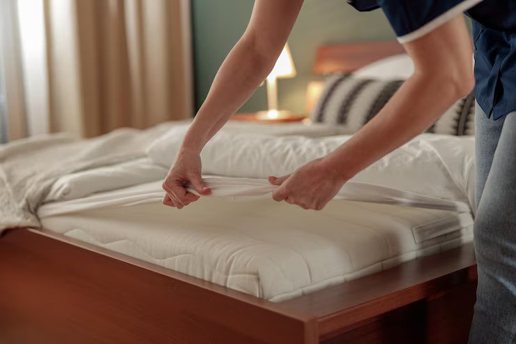 Close up cleaning lady doing housekeeping making bed hotel room 673498 2554 ezgif.com avif to jpg converter