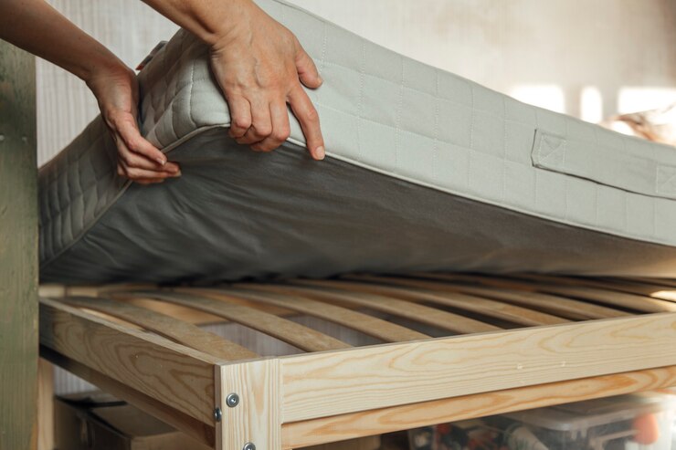Woman puts mattress bed postpones cleaning process 325774 274
